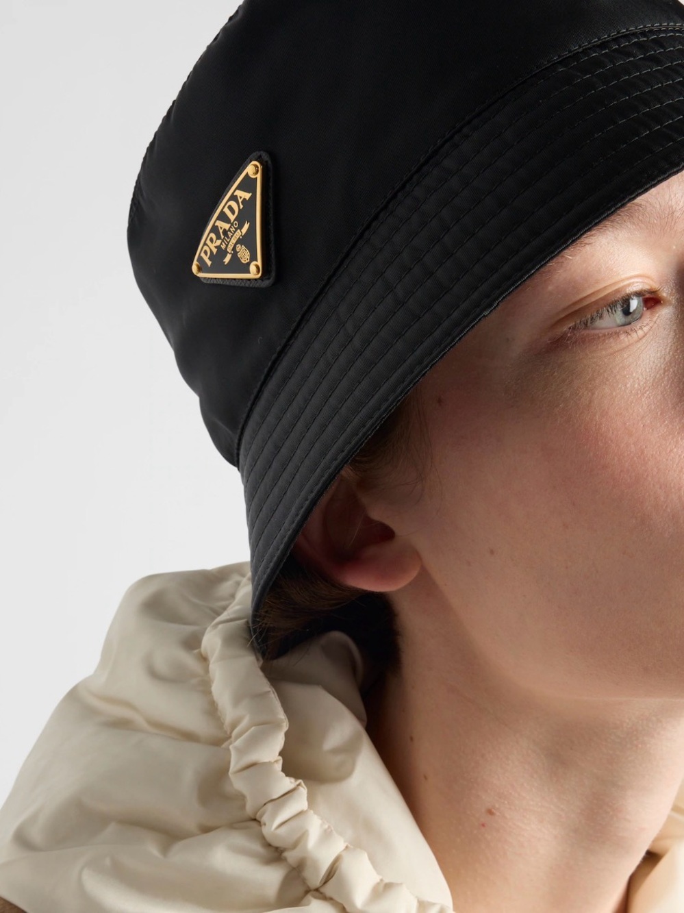Prada Black Nylon Bucket Hat with Gold Triangle Emblem
